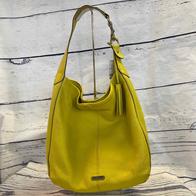 WOWW! beautiful yellow coach purse! ☀️ there is some... - Depop